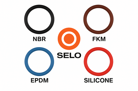 Four O-rings of different materials — black NBR, brown FKM, red silicone, and blue EPDM — arranged around the orange and black Selo logo on a white background, showing material comparison.
